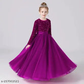 Embellished net sequence gown dress for girls aged 5-16, featuring long sleeves, sequin work on velvet, and soft touch nylon net bottom. Indian origin