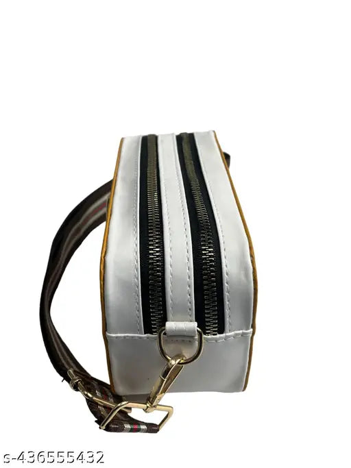 PU sling bag, 2 compartments, free size (8in x 3in x 4in), solid pattern, great for daily use, made in India