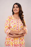 White-yellow printed cotton anarkali kurta for women, three-quarter sleeves, versatile for daily, party, casual, and office wear. Comfortable 100% cotton fabric." (125 characters)