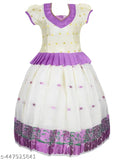White cotton Kerala Pavada Set with Lavender Bloom, traditional Indian girls' clothing adorned with gold zari work for festivals and celebrations