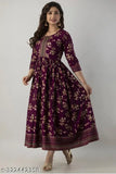 Wine-colored rayon Anarkali border print kurti with tassels, three-quarter sleeves and flared silhouette - ideal for everyday ethnic wear