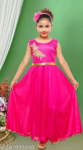 Pink polycotton sleeveless unicorn embroidered net kids gown for party wear, best quality dress for girls aged 2-5 years. Made in India." (106 characters)