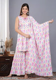 Rayon embroidered kurta sharara & dupatta set, sleeveless Indian fashion in vibrant hues. Women's traditional attire on mannequin