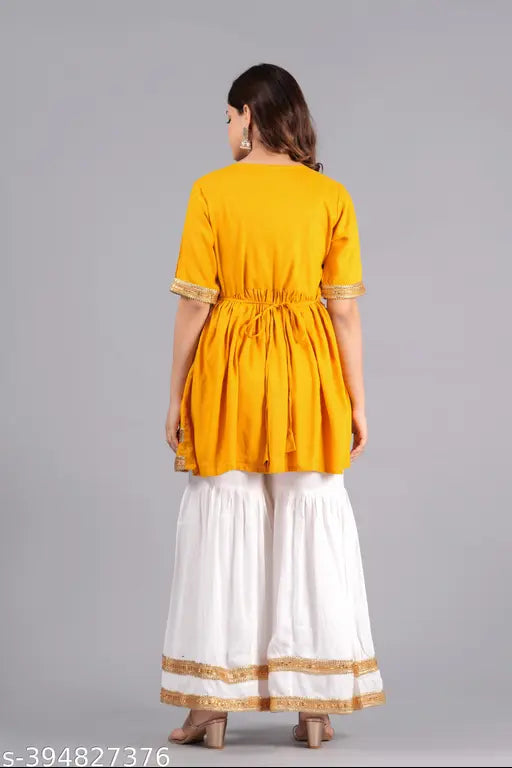 Yellow rayon sharara set with belt and neckless: Breathable, vibrant Indian ensemble featuring floral print, square neckline, and short sleeves