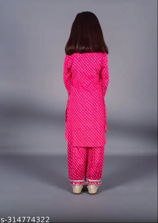 Kidaroo Girls cotton printed kurta and pyjama set, ready-to-wear party wear for girls aged 1-14. Indian-made traditional kurta and pyjama set with frilled hem, spread collar, and three-quarter sleeves. Best gift for occasions like weddings, ceremonies, parties, birthdays, festivals