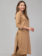 Hand-embroidered woolen winter kurta in rich rainbow yarn, featuring round neck and three-quarter sleeves. Premium quality for women's ethnic wear from India