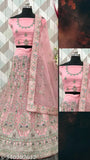 Heavy pink net embroidered Lehenga Choli with semi-stitched blouse and dupatta, perfect for festive occasions