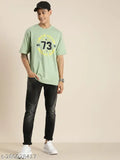 Cotton men's round green t-shirt with printed typography, oversized fit for casual style, made in India (S: Chest 42in, Length 29in; M: Chest 44in, Length 30in; XXL: Chest 49in, Length 32in)