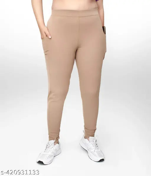 Trendy women's beige pocket jeggings, polyester, solid net, versatile casual wear