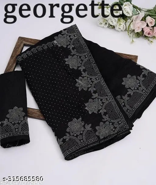 Black Georgette saree with trendy diamond work, embellished net blouse on mannequin