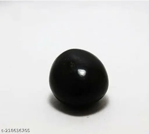 Black 5cm Shaligram stone showpiece, natural from Gandaki River, Nepal. Vastu-compliant glass Shivling decor." (93 characters)