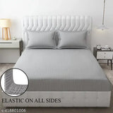 Premium glace cotton double bedsheet and pillow covers, stain-resistant, wrinkle-free, breathable, hypoallergenic. Ideal for home, hotels, guest houses, villas. White color, large size (90x100 inch/228x254 cm), 250 thread count. Wash instructions: Separately at first, cold machine wash, no bleach, no tumble dry, dry in shade. Made in India