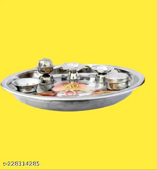 Stainless steel pooja thali set with deepa agarbatti stand, perfect for spiritual ceremonies like Grah Pravesh, Raksha Bandhan, Ganesh Chaturthi, Navaratra, Diwali. Lightweight, sturdy, and rust-resistant. Includes 1 pooja thali, 1 incense holder, 1 diya stand, and 1 small katori. Ideal for home or office decor. Made in India