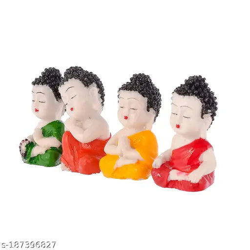 Multicolor polyresin baby monk Buddha statues for home, office decor. Detailed handcrafted figurines by Indian artists. Positive Feng Shui showpiece (6x4x3 cm each), ideal for gifting or home warming. Pack of 4 from India