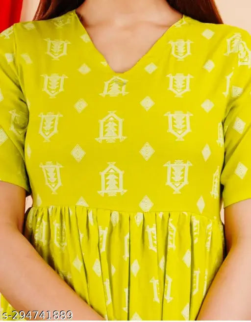 Yellow viscose rayon printed lemon kurti for women with short sleeves, perfect for current trends and regular wear. Indian-made, soft against the skin, suitable sizes: S, M, L, XL, XXL