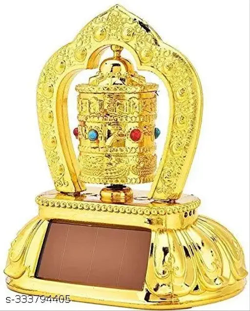 Gold-plated solar rotating Tibetan prayer wheel, 12cm, modern religious art piece for cars, offices, or shops. Emits positive energy without battery. Made from plastic