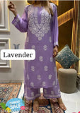 Rayon Chikankari work kurta and palazzos, intricately embroidered Indian outfit on display