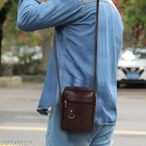 Faux leather/leatherette men's crossbody bag, solid net design, perfect for travel or office, adjustable shoulder strap, free size (L7in x W2in x H9in)