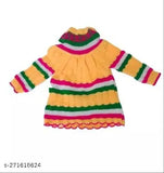 Warmest wool winter sweater frock for girls with self-design pattern, long sleeves, and soft elastic. Comfortable and breathable for kids' skin, available in sizes from 3-6 months to 0-1 years. Made in India