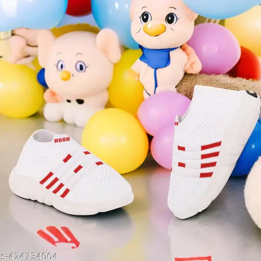 White canvas and rubber slip-on sneakers for kids, featuring whistle sound design. Perfect for parties, sports, or casual wear