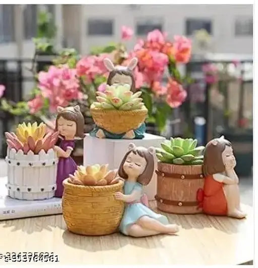 Attractive resin circular planters, set of 4, Indian-made garden pot accessories