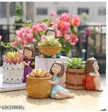 Attractive resin circular planters, set of 4, Indian-made garden pot accessories