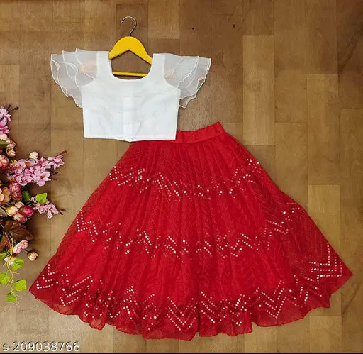 Organza-net embellished lehenga for girls aged 2-8 years, featuring short sleeves and solid design. Handcrafted Indian lehenga choli with intricate embroidery