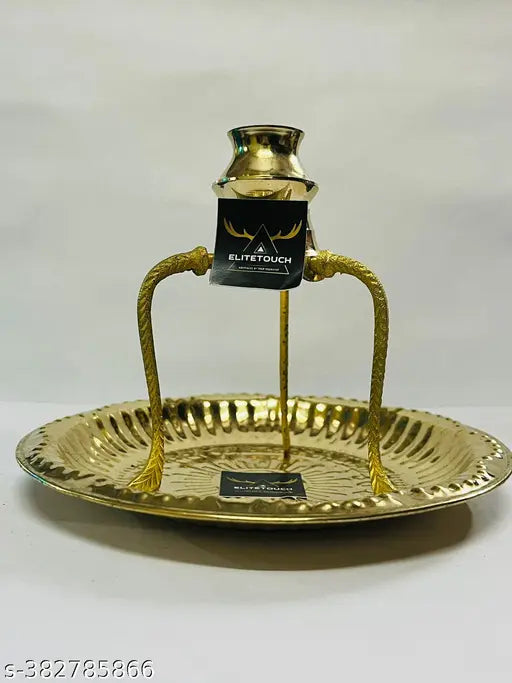 Brass pooja plate thali with gold Shivling stand and abhishek lota, ornate Indian decorative item for religious rituals
