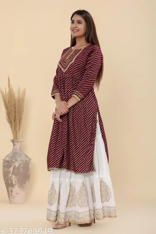 Purple Nyra rayon skirt set with printed net pants, three-quarter sleeves, Indian ethnic wear