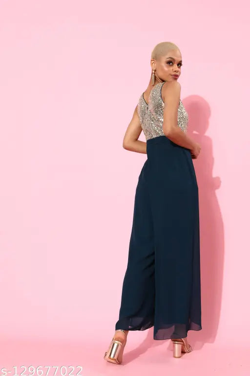 Teal polyester solid-round-neck jumpsuit by Miss Chase, relaxed fit with zip closure and side pockets, XS to XL sizes available
