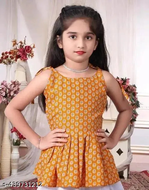 Yellow crepe dhoti and sleeveless top with printed design, solid bottom for children aged 3-4 years or 11-12 years, traditional Indian attire