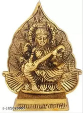 Antique golden finish Saraswati showpiece with leaf backdrop, 13cm metal idol of Maa Saraswati Ji, Hindu goddess of wisdom and learning