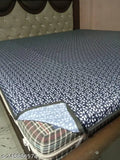 Blue printed PVC waterproof baby mattress protector, soft terry cotton feel with TPU film for elastic tuck-in corners. Waterproof and breathable protection against allergens, easy wash in the machine