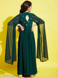 Green Georgette maxi dress with cherry print, long sleeves, and embroidered net pattern. Girls clothing from India