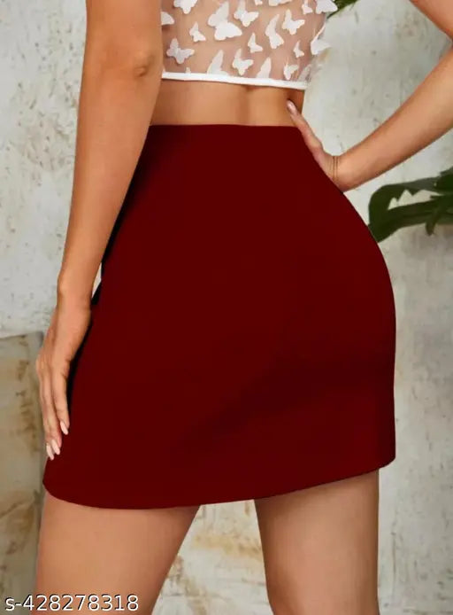 Maroon-vine embellished net party skirt with sparkling Rhinestones and 4-way stretch for women's nightwear. Available in sizes 28-36. Made in India