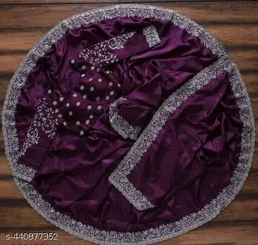 Purple embroidered georgette silk saree with separate blouse piece, embellished border and pallu for traditional festive wear