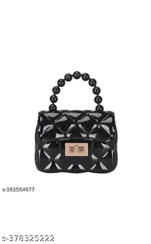 Canvas & leather silicon sling bag for girls, petite size (4x3 inches), gold chain strap, twist lock closure. Cute accessory designed in India