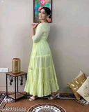 Green lurex cotton embroidery kurta set, three-quarter sleeves, India origin. Light green fashionable gown with tessels and mirror work embroidery. Available in sizes S to 6XL