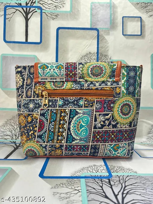 Elegant fabric sling bag with three compartments, free size, self-design pattern. India-made accessory for women and girls on display