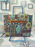 Elegant fabric sling bag with three compartments, free size, self-design pattern. India-made accessory for women and girls on display
