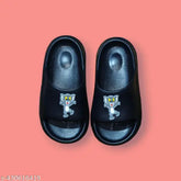 Tom & Jerry black PVC flip flops - stylish and comfortable for kids age 18 months to 45 years, cartoon character pattern on display