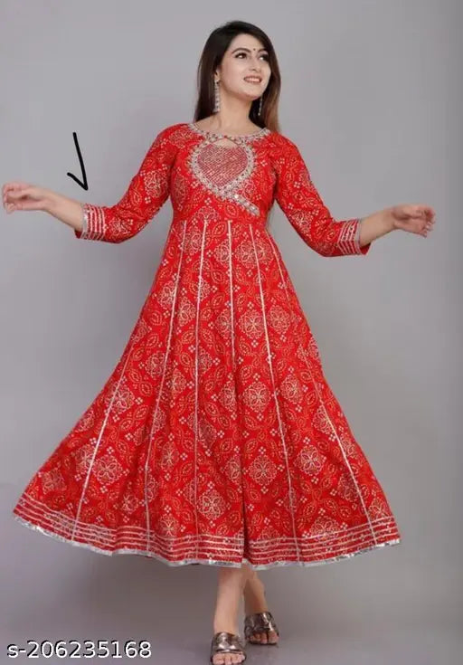 Designer Bandhani Rayon Kurta with heavy embroidery, three-quarter sleeves, vibrant dyed/washed pattern. Indian ethnic wear for women on mannequin