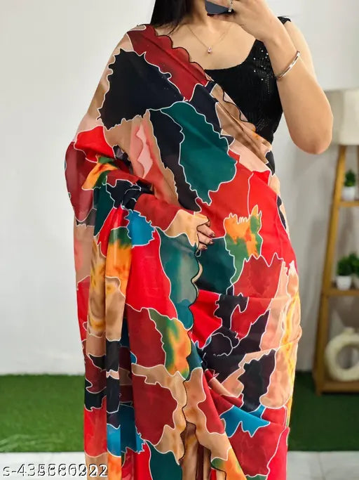 Multi-colour georgette saree with cutwork border, embellished blouse & high-quality print