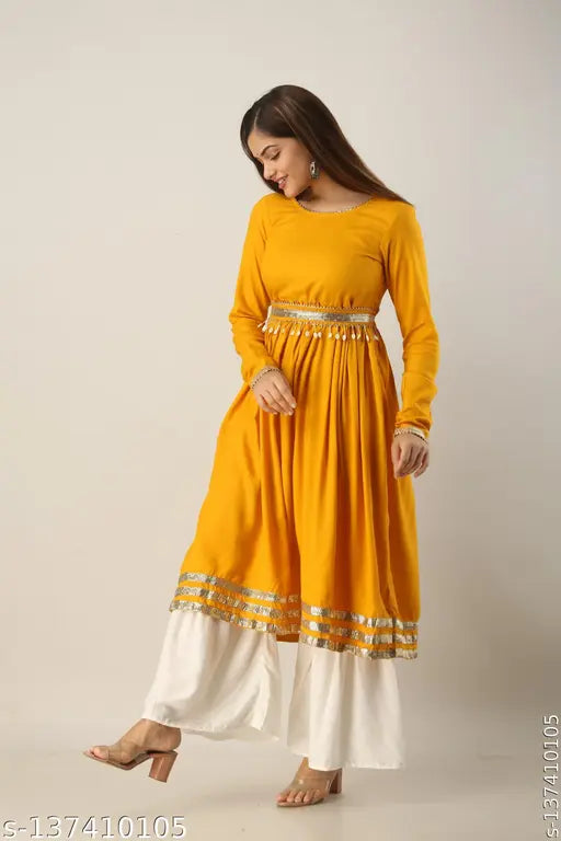 Women's yellow kurta and white sharara set in rayon, solid pattern, long sleeves, made for XL (42in bust) and XXL (44in bust), India origin