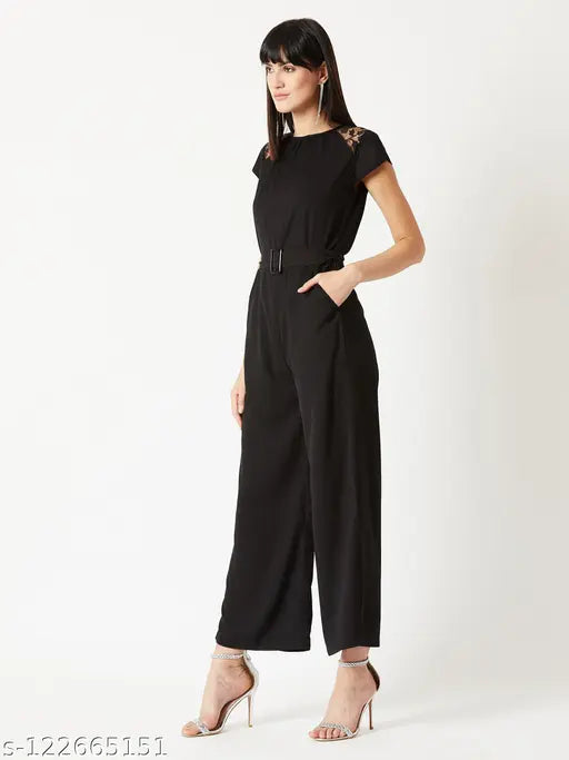 Black crepe women's jumpsuit by Miss Chase, solid design with short cap sleeves, belted fit, size XS-XL