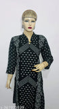Black woolen kurti with white flower print, three-quarter sleeves. Warm, stylish, dry clean only