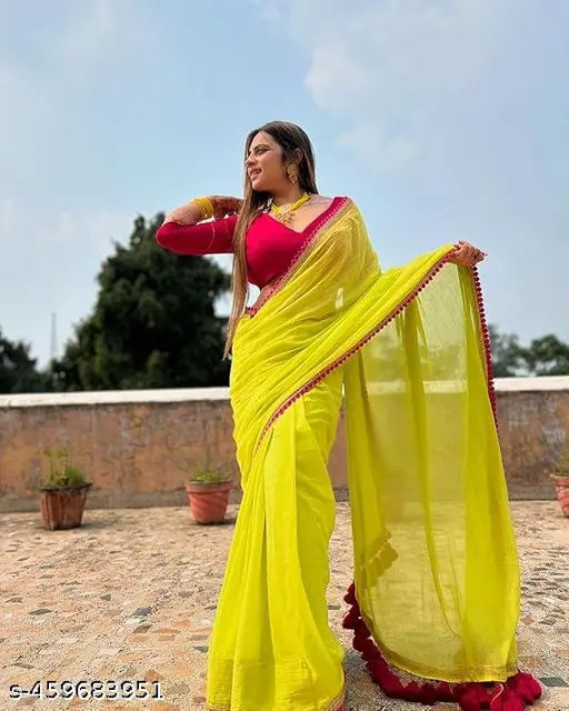 Lemon green georgette saree with designer latkan and pink samosa lace, paired with a solid Bangalori silk blouse