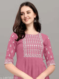 Embroidered rayon kurta in classic colors, three-quarter sleeves. Stylish party or casual wear. Relaxed fit, suitable for all weather, machine washable. Made in India