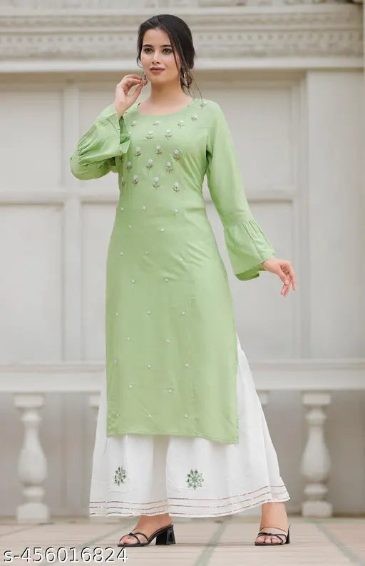 Pista Green Rayon Kurta Set with Sharara Bottom, embroidered net, three-quarter sleeves. Indian traditional clothing for women