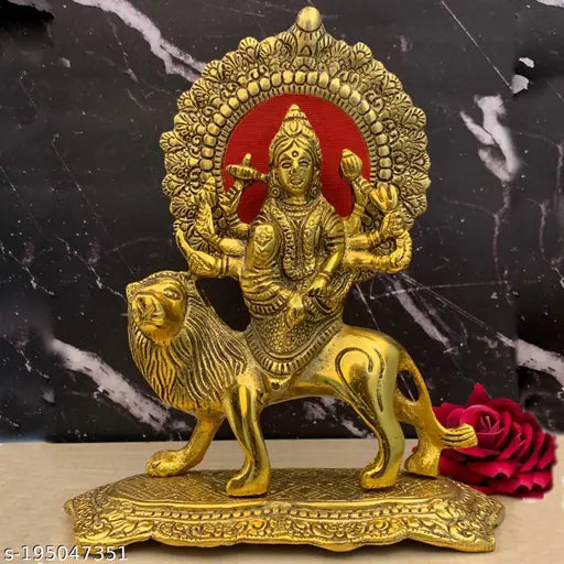 Golden brass Durga idol for puja room decor, handcrafted Indian artifact with intricate carvings, perfect for Diwali Navratri living room showpiece